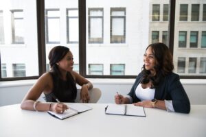 two women discussing tenant representation